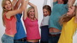 Happy friends joining their hands