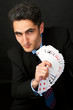 Young lucky gambler with cards Young lucky gambler with cards