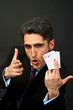 Young lucky gambler with cards Young lucky gambler with cards