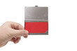 business card holder in a man's hand