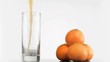 Orange juice splashing in super slow motion