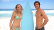 Man flirting with a female surfer