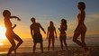 Young people playing beach ball 