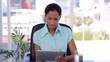 Woman using a touchscreen tablet 
