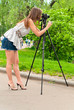 young woman with camera
