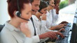 Business workers talking on headsets