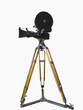 Old movie camera on a tripod