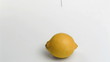 Lemon in super slow motion being modified