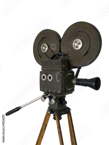 Photo: Old movie camera isolated on white Old movie camera isolated on white