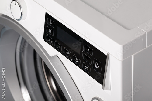 Photo: Detail of washing machine. Detail of washing machine.