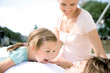 Girl with parents, smiling