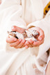 Girl holding shells, close-up