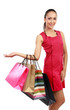 Photo: woman with shopping bags presenting woman with shopping bags presenting