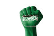 Fist painted in colors of saudi arabia flag Fist painted in colors of saudi arabia flag