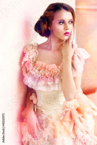 Photo: Beautiful woman in vintage dress Beautiful woman in vintage dress