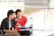 Foto: Business people looking at laptop Business people looking at laptop