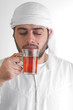 arabian guy drinking tea