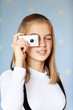 Girl-teenager photographed with camera Girl-teenager photographed with camera