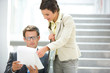 Business people looking at document