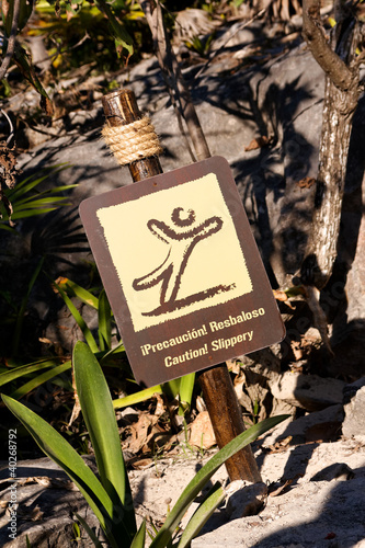 Photo: Spanish English Caution Slippery Sign Spanish English Caution Slippery Sign