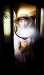 Vintage Archaeologist With Large Magnifying Glass