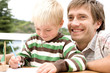 Father with son, smiling
