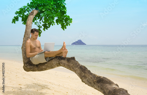 Foto: Beach laptop vacation Beach laptop vacation