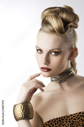 Photo: fashion girl with leopard makeup with hand near the face fashion girl with leopard makeup with hand near the face