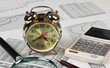 gold clock and office supplies