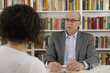 woman talking to a consultant or lawyer