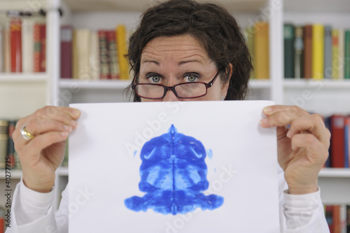 Photo: Psychotherapist holding Rorschach Test Psychotherapist holding Rorschach Test