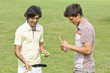 Friends smiling in park