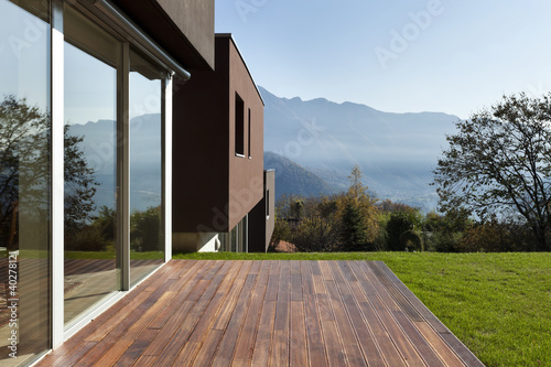 Photo: beautiful modern house with garden, outdoor beautiful modern house with garden, outdoor