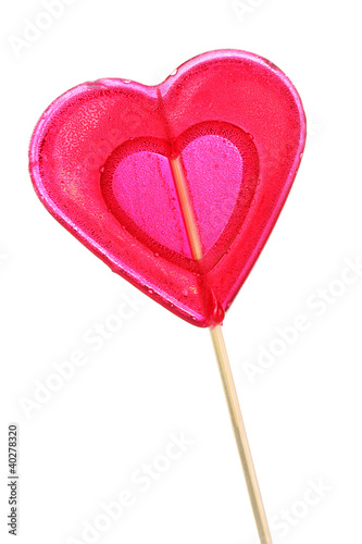 Photo: red heart-lollipop isolated on white red heart-lollipop isolated on white