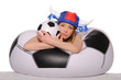 Photo: Distressed football cheerleader with ball Distressed football cheerleader with ball