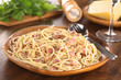 Spaghetti alla Carbonara served on wooden plate Spaghetti alla Carbonara served on wooden plate
