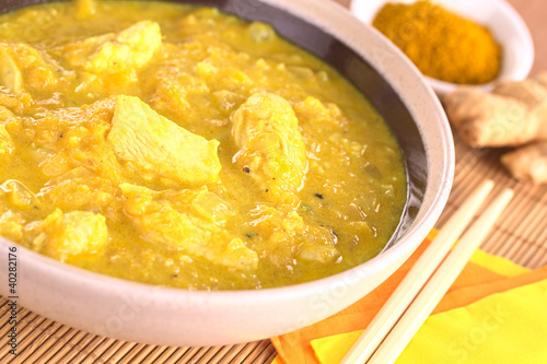 Photo: Chicken-mango curry with curry powder and ginger in back Chicken-mango curry with curry powder and ginger in back