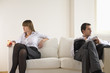 Mid adult couple sitting on sofa