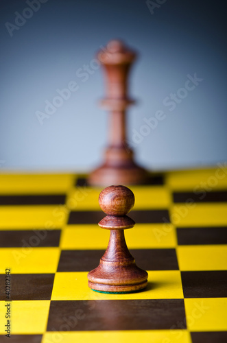 Foto: Concept of chess game with pieces Concept of chess game with pieces