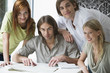 Friends gathered at cafe, smiling, portrait