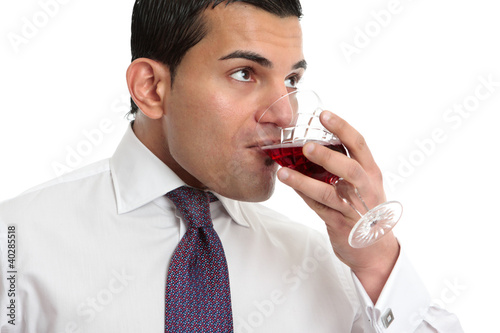 Photo: Man drinking or wine tasting Man drinking or wine tasting