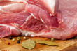 A piece of pork on a cutting board