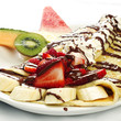 Photo: French style crepe with strawberries and bananas French style crepe with strawberries and bananas