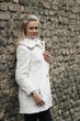 Upset Young Woman In White Fur Coat Upset Young Woman In White Fur Coat