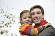 Father with daughter, smiling, close-up