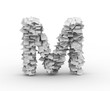 Letter M, stacked from paper sheets