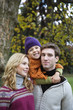 Daughter with parents, smiling