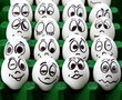 White easter eggs and funny faces White easter eggs and funny faces