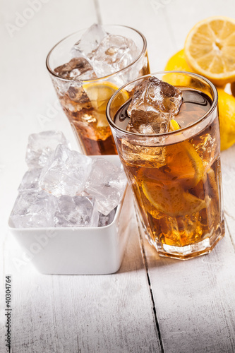 Photo: Lemon Ice Tea on white wooden table Lemon Ice Tea on white wooden table