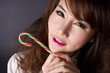 cute girl, female model pose cute action with red candy. cute girl, female model pose cute action with red candy.